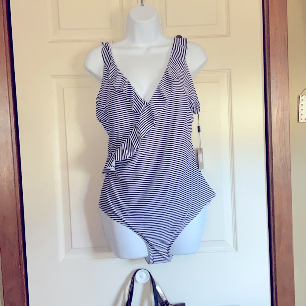 Swimsuit Striped Blue and white 
Brand new never worn nwt adjustable Boutique